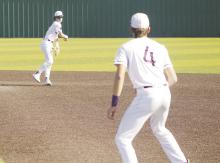 Jacksboro’s Lando Belcher, left, throws the ball to first for an out during a Tiger game. Belcher was an honorable mention Class 3A All-State selection by the Texas Sports Writers Association. Teammate and fellow senior Jackson McComis was a 3rd team selection at designated hitter.