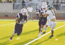 Junior running back Luke Sams (6) busts a 33-yard run during first quarter action of the Tigers’ 57-35 win Friday, Aug. 25 over visiting Breckenridge in both teams’ season opener. Sams ran for 125 yards in the contest. Photo/Mike Williams/Breckenridge American