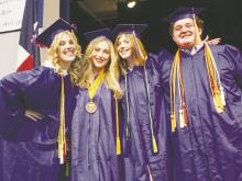 Bryson seniors, left to right, Zoe Autry, Laura Chapman, Amareta Davidson, and Jackson Eberle show their happiness at graduating Friday, May 19 at Bryson School Auditorium. After receiving their diplomas, the seniors sang the school song one last time. Photo/Brian Smith