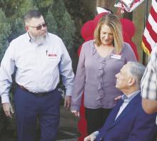 Governor Greg Abbott meets with Jim and Lisa Richardson during a candidate fundraising event Thursday, Feb. 1. Photo/Brian Smith