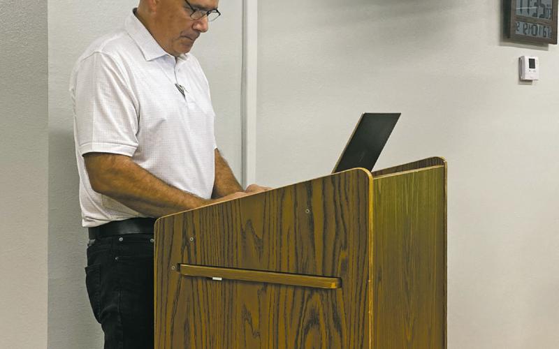 James Obermyer, with HydraPro, speaks to Jacksboro City Council members during their Monday, Dec. 12 meeting. Obermyer gave an update on how the automated water meter transition was going. Photo/Brian Smith
