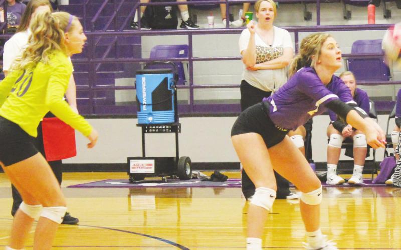 Tigerettes lose VB district opener