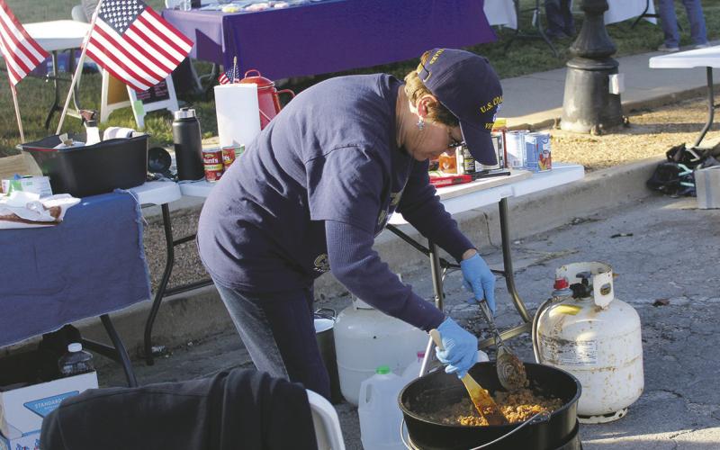 One of the nearly 20 teams of chili cookers prepares their meat during last year’s event. ChiliFest is scheduled for 3 to 7 p.m. Saturday, Nov. 12 on the downtown square in Jacksboro. File photo