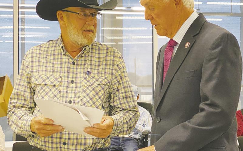 Congressman Roger Williams, right, speaks to a constituent during his Town Hall Meeting Oct. 11. Williams, who will represent Jack County in Congress beginning in January, spoke of what he will continue to do in Washington. Photo/Brian Smith