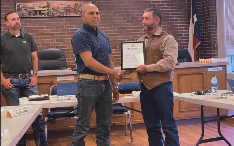 City honors man who saved another in house fire