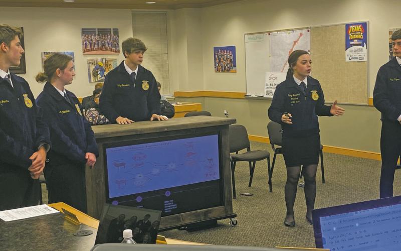 Left to right, Eli Jonas, Allie Robinson, Kolyn Besselaar, Keelyn Merworth, and Eric Pizana of Jacksboro FFA Ag Issues team debates the cloning issue at the Monday, Nov. 14 Jacksboro ISD Board meeting. Photo/Brian Smith