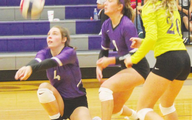 Tigerettes lose VB district opener