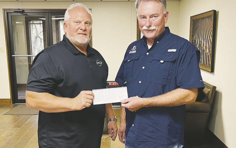 ONCOR makes donation to Vision Group