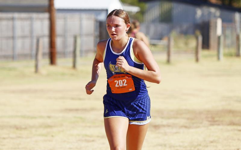 Perrin's Mckieran Murphy competes in a meet earlier this season. The freshman runner qualified for the regional meet after her fourth place finish in this morning's district meet at Perrin. (Photo/Kylie Bailey)