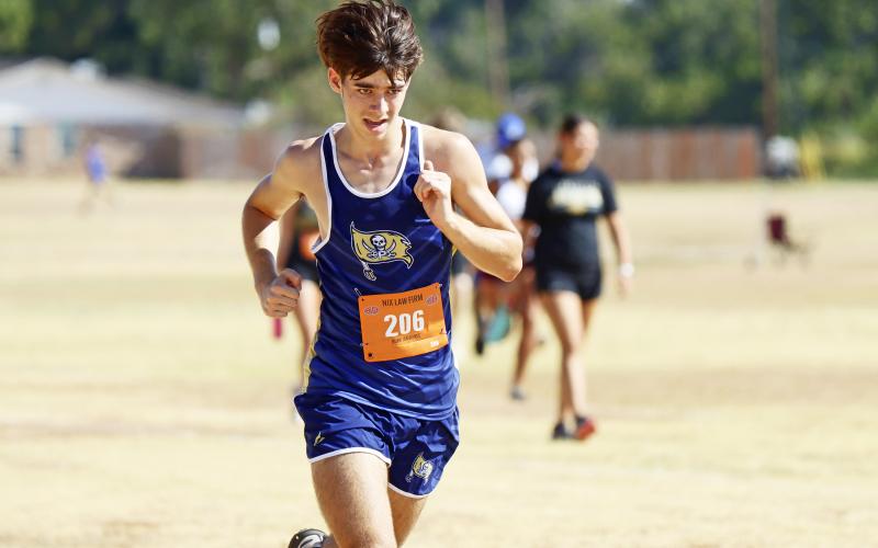 Perrin's Jack McCormick competes in a meet earlier this season. The varsity Pirates team qualified for the regional meet after their third place finish in this morning's district meet at Perrin. McCormick finished in 6th place overall. (Photo/Kylie Bailey)