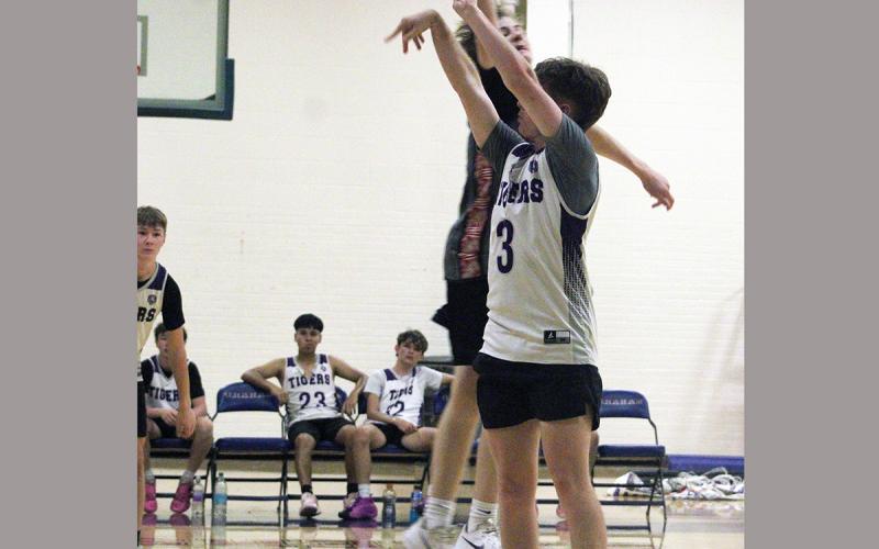 Tyler Roberts shoots a jumpshot Tuesday, Sept. 30, for the Tigers. Roberts got in on the scoring efforts for Jacksboro to go undefeated on the night. Photo/Alex Havardansky