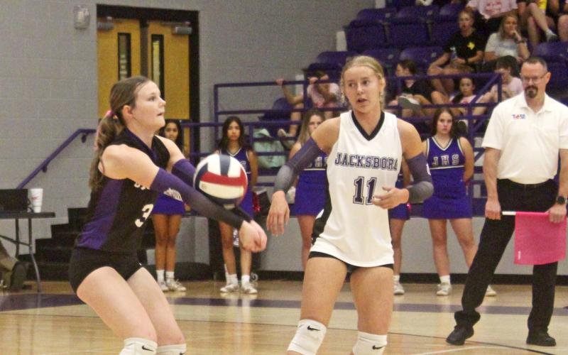 Holly Lehman returns a serve with Rylee Bennett backing up during the Tigerettes’ loss Tuesday, Oct. 15 to Vernon. Photo/Brian Smith