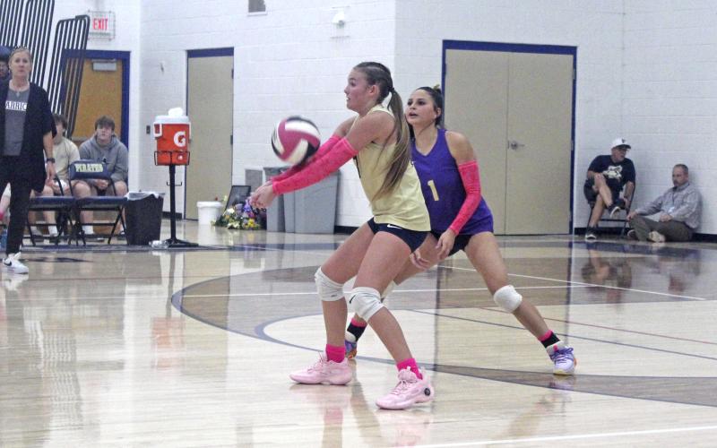 McKieran Murphy (3) returns a serve with Lauren Morris providing backup Tuesday, Oct. 29 during Perrin’s loss to Garner. Photo/Brian Smith