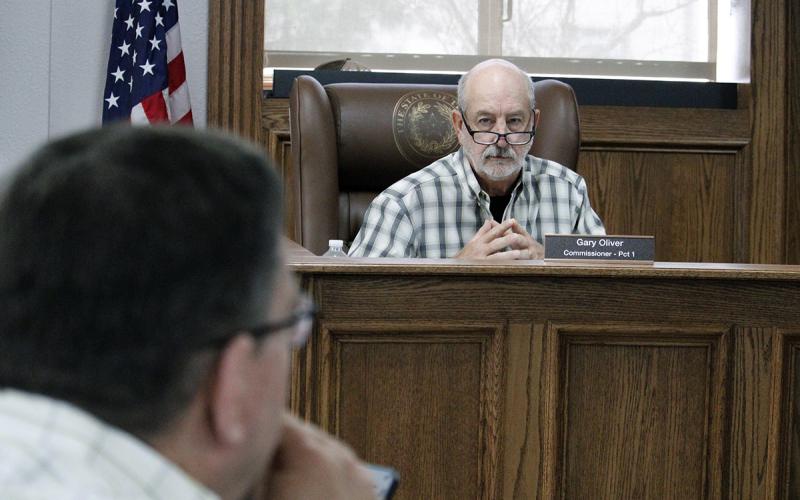 Jack County Commissioner Gary Oliver asks the sheriff’s office how its deputies process serve for the county. Commissioners voted to hire a part time deputy constable but Oliver voted against the measure twice. Photo/Ashley Anderson