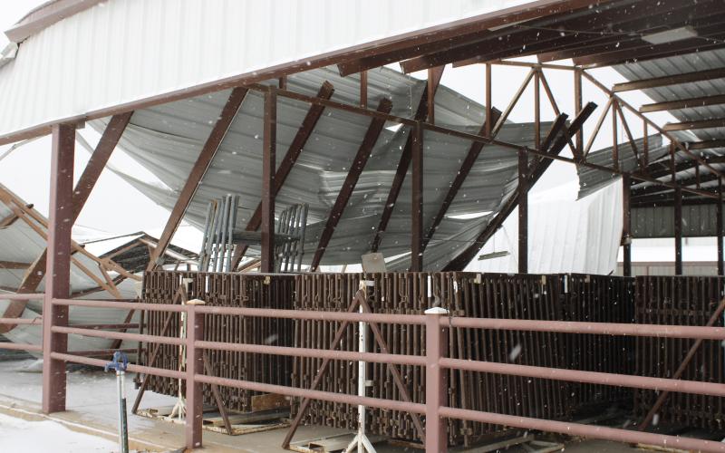 The beef pavilion at the Jack County Youth Fair grounds collapses under the weight of ice and snow overnight Friday, Jan. 23. A declaration of disaster was issued on Saturday, Jan. 24 for Jack County as officials continued to assess damages to property and infrastructure caused by the winter storm. Photo/Ashley Anderson
