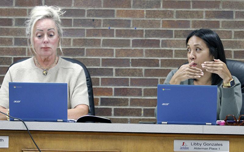 Jacksboro City Council members Shawnea’ Smith and Libby Gonzales discuss logistics surrounding a traffic pattern change to one-way streets near the middle school. Photo/Ashley Anderson