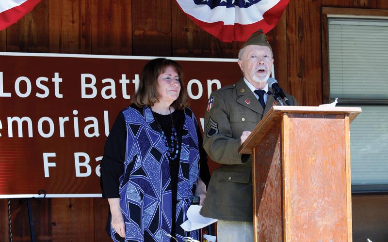 Michael Bialas, son-in-law of Lost Battalion veteran Luther Prunty, wears Prunty’s service uniform as he tells the history of Jack County’s Lost Battalion at the Jack County Museum. Pictured with Bialas is his wife, Gail Prunty Bialas. Photo/Ashley Anderson