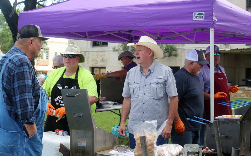 Jacksboro Lions Club members fry up fish and all the fixings at last year’s fish fry fundraiser. The annual event returns Thursday, June 4 at the Jack County Courthouse. Archive photo
