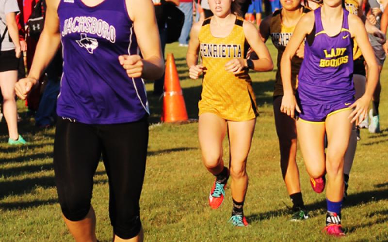 Freshman Baylee Thompson leads the pack at Saturday's cross country meet