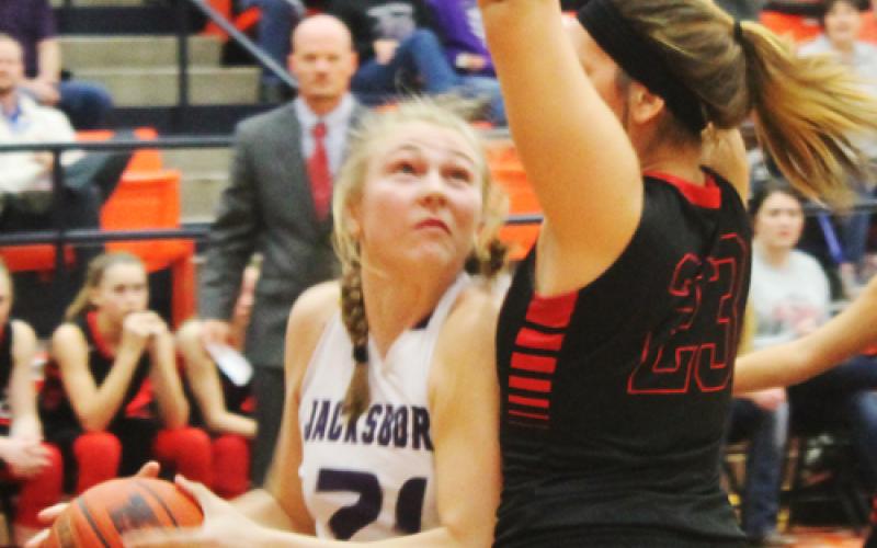 Baylee Thompson (21) had 10 points and 10 rebounds for Jacksboro in Monday night's win