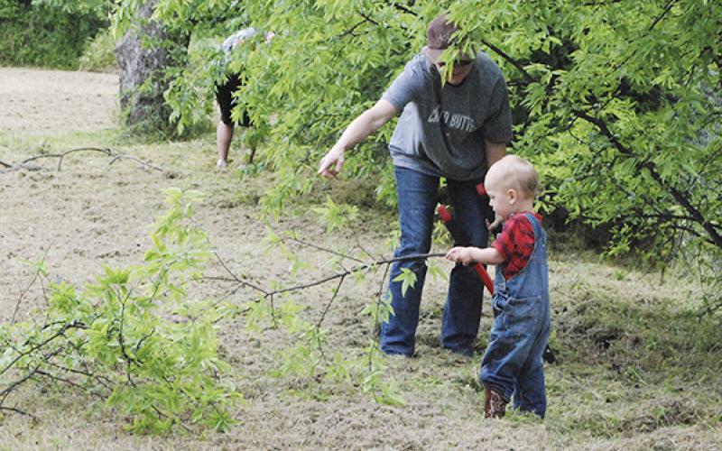 Even some tiny hands joined in to help with the cleanup for the new park Saturday. Courtesy / Terry McDaniel