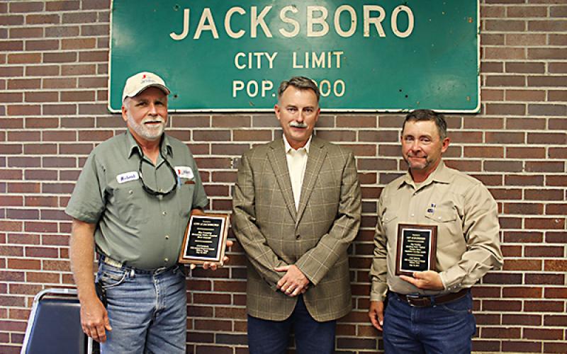 City of Jacksboro Water Supervisor Robert Tomison, City Manager Mike Smith and Mayor Alton Morris display the plaques Jacksboro won in the 2017 Big Country Drinking Water Contest.