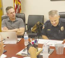 Jacksboro Police Chief Scott Haynes, right, provides one of three plans to get Bryson ISD a school resource officer beginning with the 2023-24 school year. Listening in on Haynes’ talk is Bryson ISD Superintendent Greg London. Photo/Brian Smith