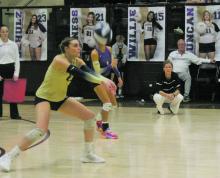 Kennadee Langham returns a Harrold serve during area round action Nov. 2. Perrin was swept by state-ranked Harrold. Photo/Brian Smith