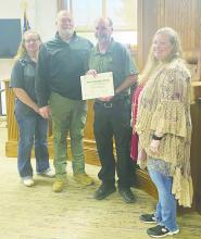 Jack County Jail employee Russell Walden, second from right, received a safety award from the county earlier this month for his work in providing a safe working environment at the jail where he works as a jailer. Photo/Brian Smith