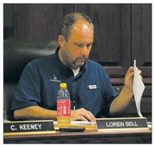 Perrin-Whitt CISD Superintendent Loren Sell looks over the budget documents during the board’s Friday, Aug. 30 meeting. Photo/Kylie Bailey