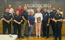 Jacksboro Police Department received just under $10,000 from The Dickey Foundation for the purchase of new radios for their police vehicles during the city council meeting Monday, Aug. 26. Contributed photo