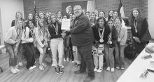 Jacksboro High School cheerleaders and coaches are honored Monday Jan. 23 by Mayor Craig Fenter and the city of Jacksboro. Photo/Brian Smith