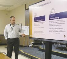 Perrin-Whitt CISD Superintendent Loren Sell explains bond financing and tax rates during the Wednesday, April 23 meeting. Election Day is Saturday, May 3. Photo/Brian Smith