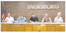 From left to right, Tyler Harmonson, Joel Hood, Greg Robinson, Mayor Alton Morris, Jr., and Shawnea Smith look over Jacksboro’s Strategic Plan as part of the Monday, May 12 meeting. Libby Gonzales is not pictured. Photo/Brian Smith