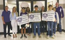 Jacksboro Middle School and the Jacksboro Lions Club honored students for the fifth six weeks. Sixth grader Jonathan Solis-Castillo, seventh grader Ryan Whatley and eighth grader Brock Gregory received yard signs, a certificate and a gift card. Photo/Brian Smith