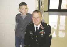 Veteran Tim VanZant during his military career with his son. His son talked him into coming out of the Army. Contributed photo