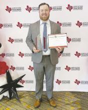 Bryson FFA sponsor Jesse Laine won the Mid-Career Teacher of the Year award at the Texas FFA Convention in Dallas last month. Perrin’s Jacob Lange won the award in 2023. Courtesy photo