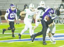 Cannon Valenzuela looks for more yardage during the Tigers’ 62-34 win Friday, Nov. 22 over Scurry-Rosser. Jacksboro faces Gunter in the regional semifinal round at 2 p.m. Friday, Nov. 29 at Pennington Field in Bedford. Photo/Brian Smith