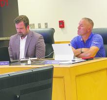 Jacksboro ISD board members Mason Spiller, left, and Kelly Mower listen in on the district’s budget during the Monday, Aug. 12 meeting. Photo/Brian Smith