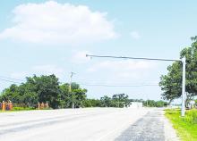Jacksboro police and Texas Department of Transportation officials worked together to get overhead flashing school zone lights installed last week. TxDOT Chief/ Engineer David Salazar will be coming to town quarterly to see how projects are progressing throughout the county and also with the Jacksboro ISD on bond issue projects. Courtesy photo