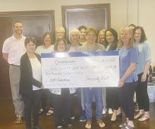 Jack County Child Welfare Board members Debra Tillery, Terri Stretcher and Sharon Robinson accepted a $3,500 check from Prosperity Bank for the hard work the organization does in the community. Prosperity Bank Manager Nuvia Salazar and employees of the bank made the presentation. The JCCWB helps children and their families who are in domestic violence and other situations get the help they need. Photo/Brian Smith
