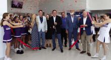 Members of the community celebrate with Four Stars Ford as it opens at its new location in Jacksboro last week. Cutting the ribbon is dealership manager Floyd Goatcher. Four Star Ford opens at its new location in Jacksboro as the 2025 Ford dealer of the year in Texas, ranked by customers on cars.com. Photos/Ashley Barner