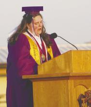 Jacksboro High School Valedictorian Rayann Conner speaks to her classmates and a large crowd Friday, May 23 at Tiger Stadium. Jacksboro graduated its largest class ever with 93 graduates. Photo/Brian Smith