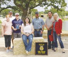 Jacie Pennington, sitting, had a soft grand opening for her community park/outdoor classroom Saturday with her family and friends helping celebrate. The project is a Ford Leadership Scholar project. Photo/Brian Smith
