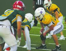 Jacksboro lineman Wade Treadway (50) anchors the line for the West All-Stars during the Oil Bowl All-Star game Saturday, June 7. Treadway was joined by Tiger teammates Gannon McElroy and Luke Sams. Photo/Alex Havardansky/The Graham Leader