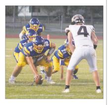 Bryson’s Ben Bennett, center, and Gavin Sadler were named to the District 6-1A Division I all-district team.