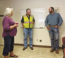 Jack County Chief Appraiser Chase Lewis, right, had a farewell reception Thursday, Oct. 12. Lewis is taking a position in New Mexico. Tax Assessor-Collector Sharon Robinson, left, and Jacksboro City Manager Mike Smith say their goodbyes. Photo/Brian Smith