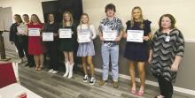 Jacksboro Chamber of Commerce board members presented eight $500 scholarships to Jacksboro High School seniors for their hard work and dedication during a recent program. Photo/Brian Smith