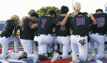 Tigers say a prayer Friday, May 31 before their game two loss against the Brock Eagles in Graham. Photo/Kylie Bailey