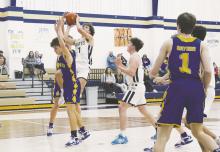 Perrin’s Dayne Thompson (11) drives to the bucket and a layup during second-half action of Perrin’s victory Tuesday, Feb. 14 over Bryson. The Pirates finished 2nd in District 21-A. Photo/Brian Smith